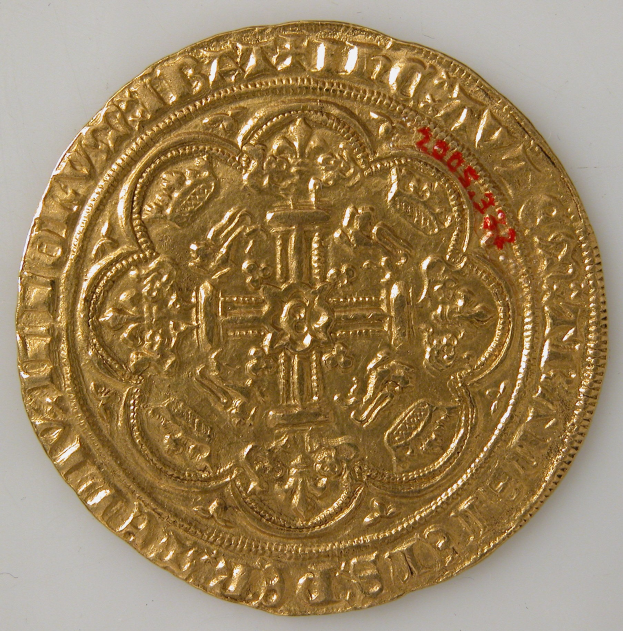 Goldmünze mit einem Wappen, detaillierten Designs und Text auf einem weißen Hintergrund.