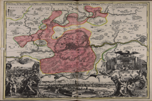 Ein altes Buch mit einer zentralen Deutschlandkarte, umgeben von Illustrationen und Text, strahlt einen klassischen und zeitlosen Stil aus.